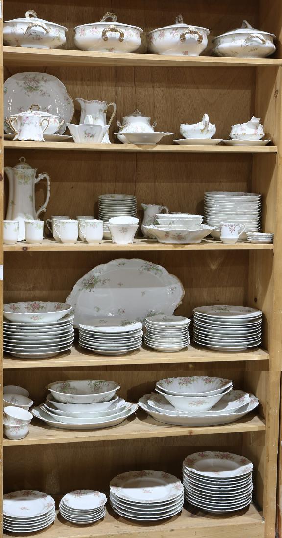 Six shelves of French Limoges dinner service (1 of 3)