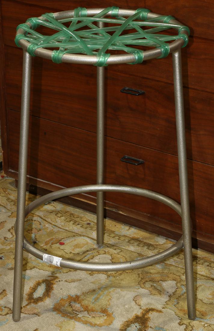 Fernando and Humberto Campana "Zig Zag" stool, 2001,: Fernando and Humberto Campana "Zig Zag" stool, 2001, Brazil, the silvered powder-coated steel frame with green plastic wrapped seat, 24.5"h x 17"dia.