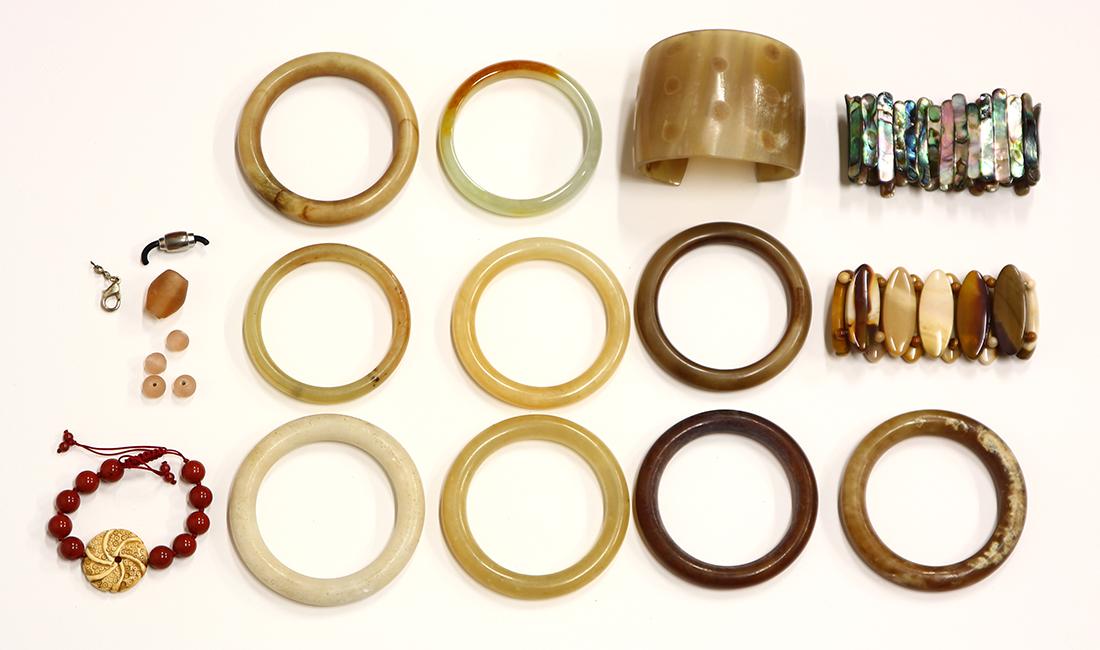 Collection of multi-stone, glass, shell, metal jewelry: Collection of multi-stone, glass, shell, metal jewelry Including 1) jadeite bangle; 3) serpentine and nephrite bangles; 5) calcite bangles; 2) jasper and bone bead bracelets; 1) abalone shell bead bra