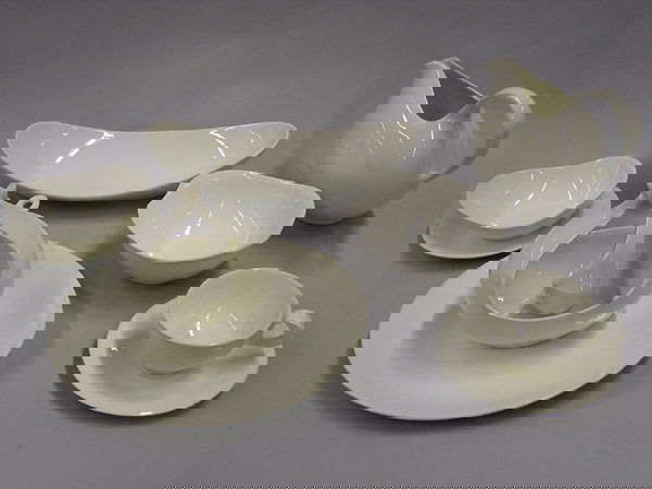 Hallcraft China by Eva Ziesel, white: Thirty-five piece Hallcraft China by Eva Zeisel in white, chips to some including sauce bowl