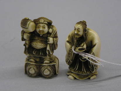 Two Japaanese ivory netsuke: "Two Japanese ivory netsuke, 20th century, the first depicting a Chinese immortal standing in long brocade-edged robes and holding the peach of immortality beneath his beared face, the base with red