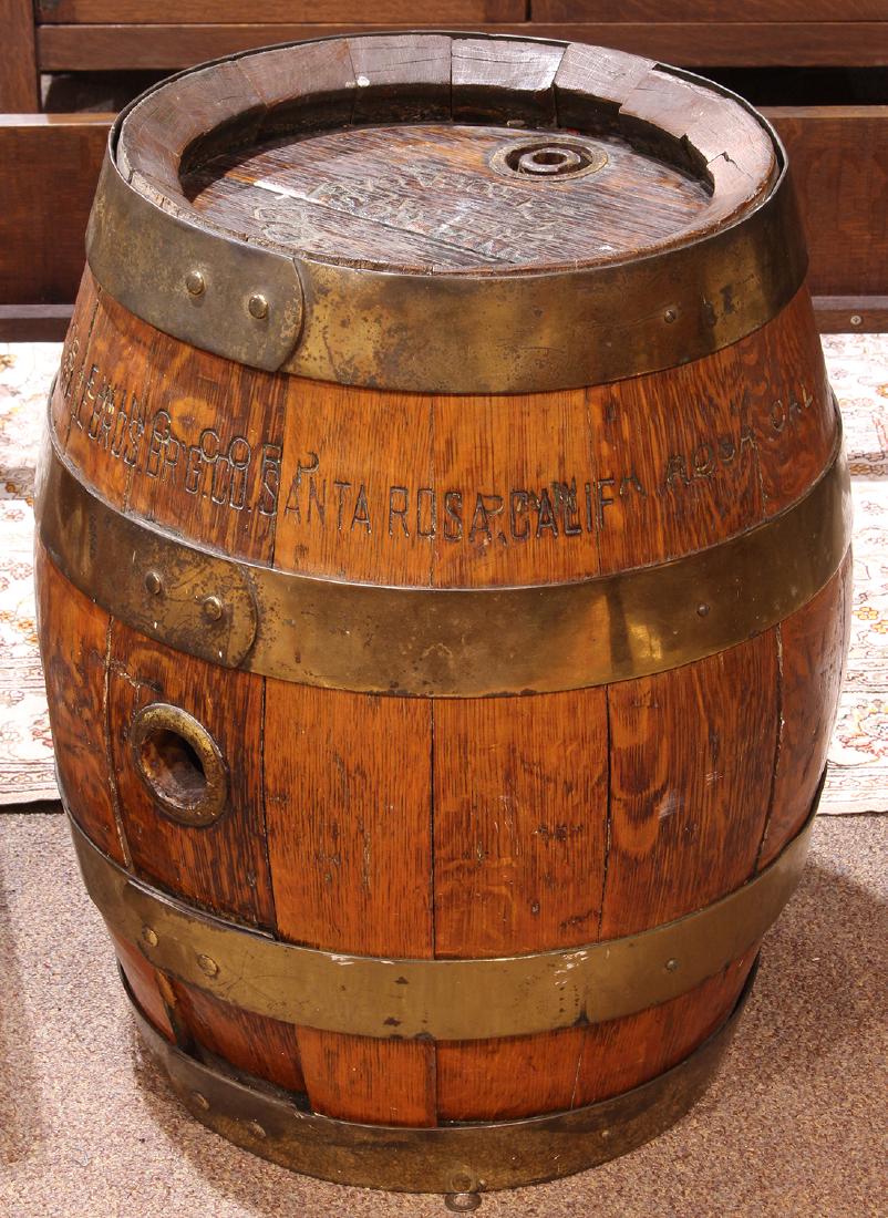 Grace Brothers Brewery: Grace Brothers Brewery, Santa Rosa, quartersawn oak beer keg, early 20th century, having a double embossed top, above the case having brass hardware, 25"h