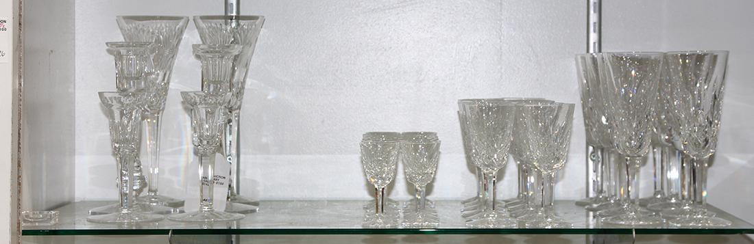 (lot of 38) Collection of Waterford stemware in the: (lot of 38) Collection of Waterford stemware in the "Lismore" pattern, consisting of (8) claret wines, (12) sherry glasses, (12) cordials; together with two pairs of associated candlesticks and a pair