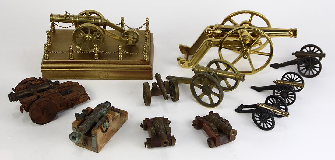 (lot of 11) Miniature cannon group, executed in brass, (1 of 3)