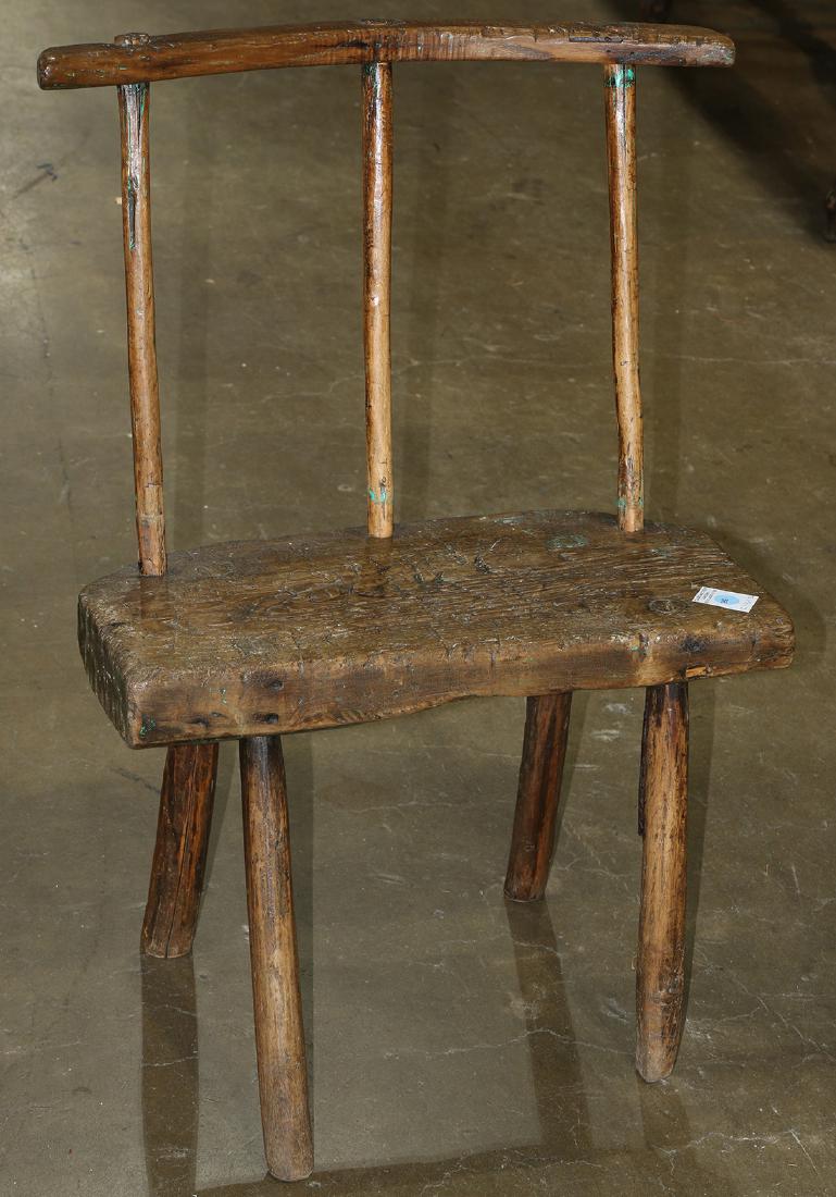 Primitive side chair, having a spindle back above a (1 of 1)