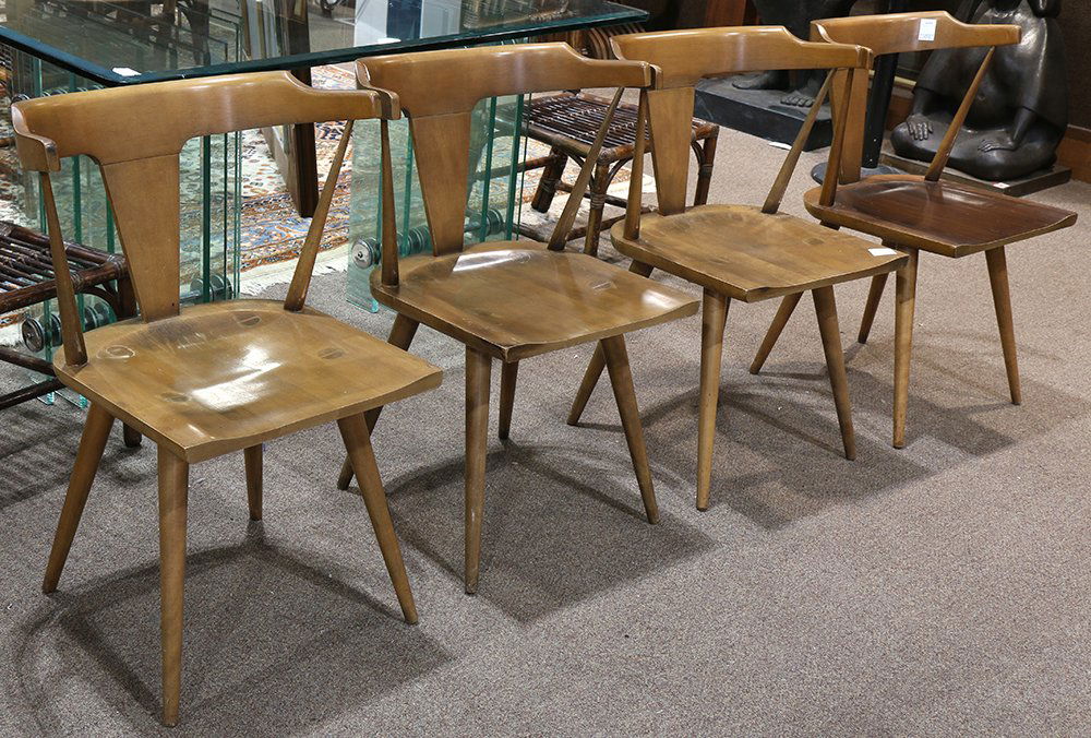 Paul McCobb for Planner Group walnut captain's chairs: (lot of 4) Paul McCobb for Planner Group walnut captain's chairs, each having a shaped crest, above a single splat, and rising on tapered legs, 30"h