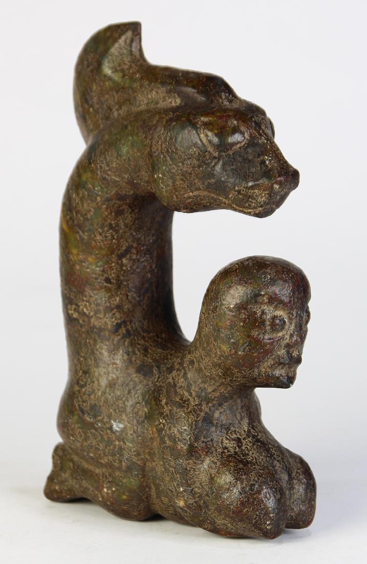 Pacific Island stone carving, depicting a zoomorphic (1 of 8)