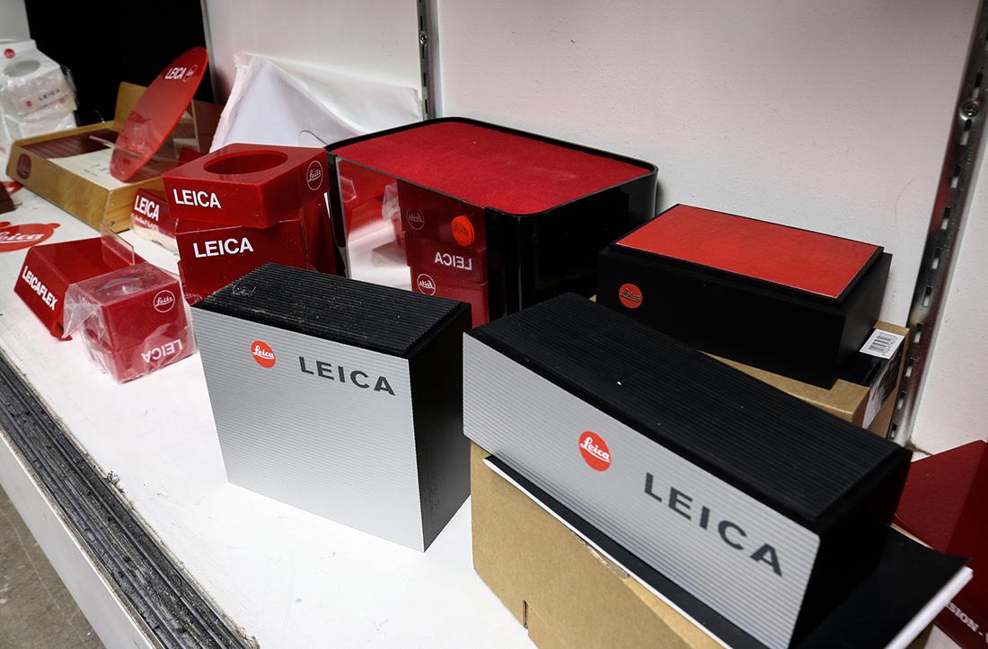 One shelf of Leica/Leitz advertising and display items, (1 of 2)