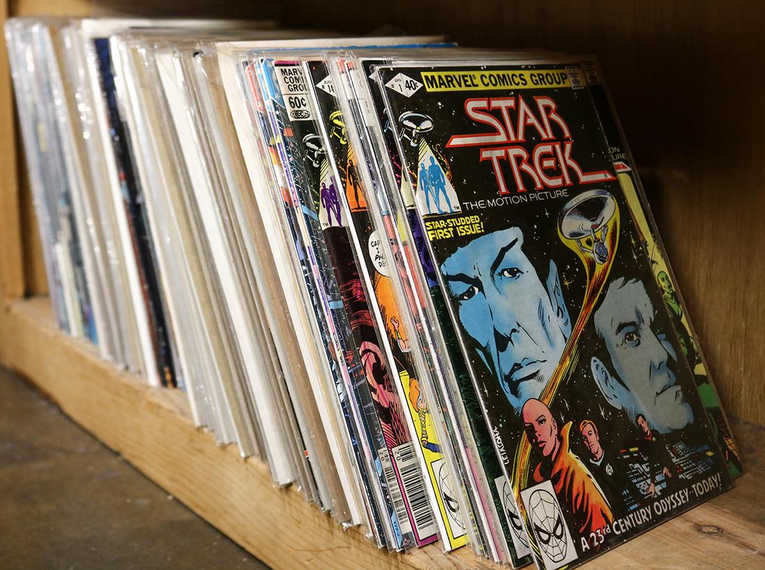 One shelf of comic books including Marvel and DC (1 of 1)