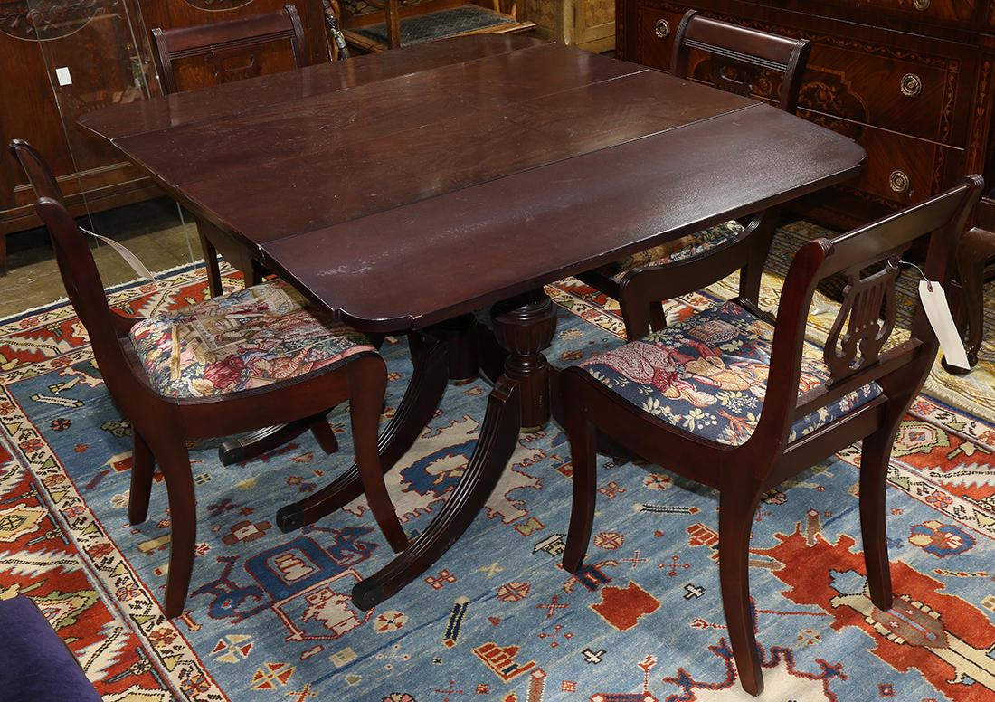 Duncan Phyfe style dining suite: (lot of 5) Duncan Phyfe style dining suite, consisting of a triple pedestal dining table, having three leaves, 30"h x 50.5"l w x 42"d; together with (4) dining chairs, having a lyre form back splat an