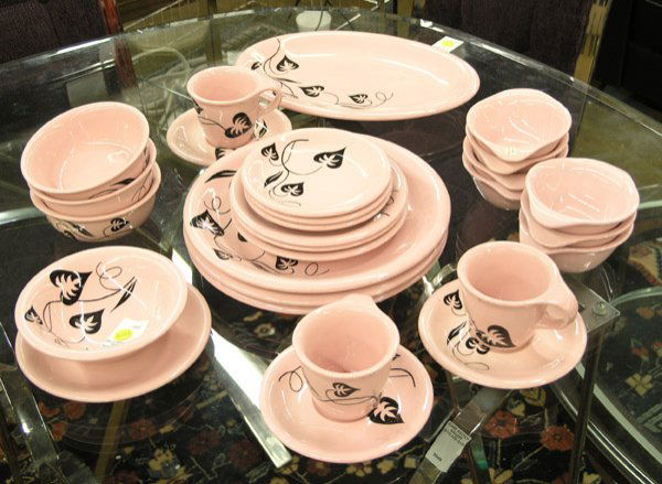 Russel Wright dinnerware: Group of Russel Wright sterling china dinnerware in shell pink pattern for 3 plus extras consisting of bowls, 7'' plates, cups and saucers etc.
