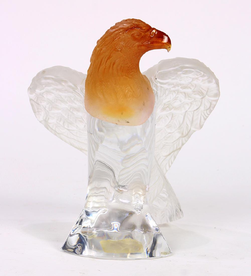 Daum France Pate de Verre crystal eagle, having an: Daum France Pate de Verre crystal eagle, having an amber colored head continuing to the frosted to clear body marked Daum France, and retains Daum decal, with original box, 8"h; Provenance: Property