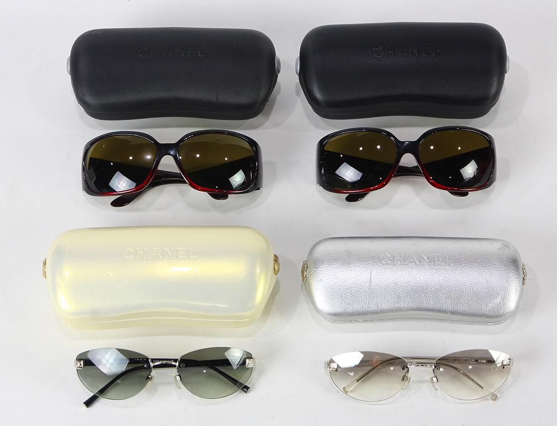 Chanel sunglasses group, one having red frames accented (1 of 3)