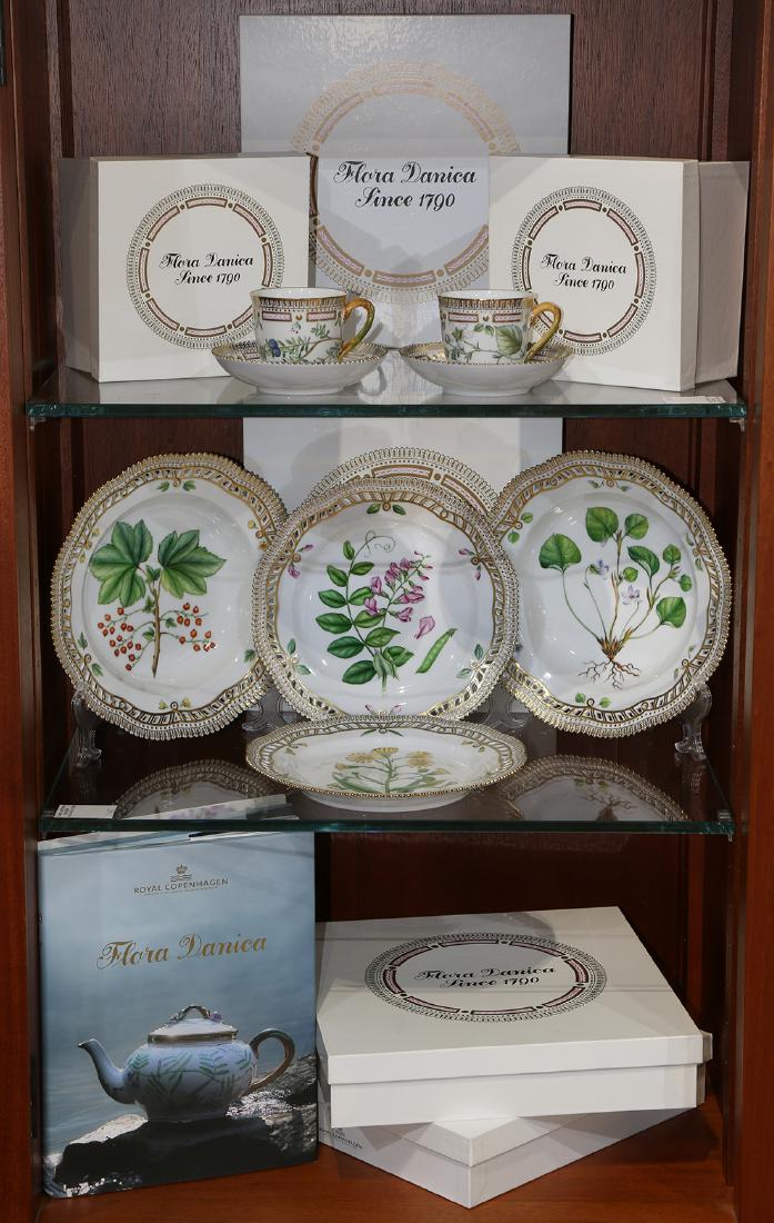 Royal Copenhagen Flora Danica hand painted table: (lot of 8) Royal Copenhagen Flora Danica hand painted table articles, each hand painted with floral reserves, and gilt rims, consisting of (2) demitasse cups with saucers 2.75"h, (2) soup bowls 9.25"w