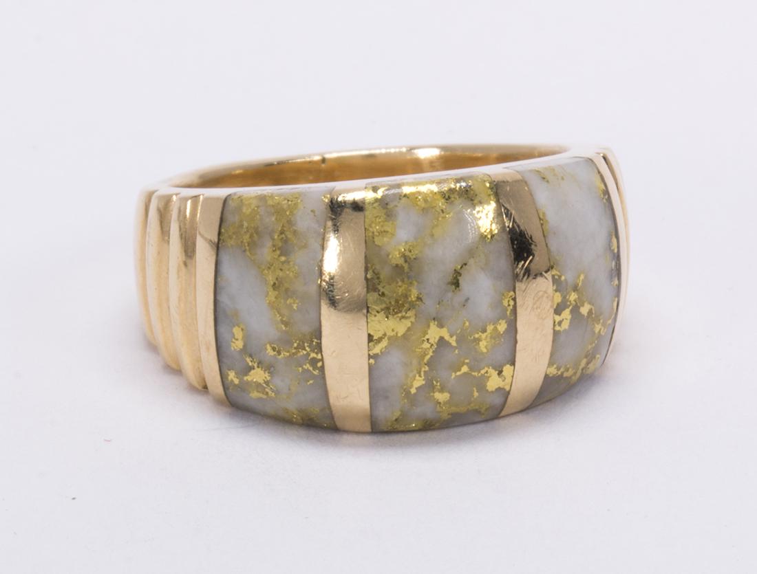 Gold-in-quartz and 14k yellow gold ring: Gold-in-quartz and 14k yellow gold ring Featuring (3) gold-in-quartz inlaid wedges, measuring approximately 10 X 6 mm to 9 X 5 mm, set in a ribbed, 14k yellow gold mounting, size 4 1/2, gross weight 8