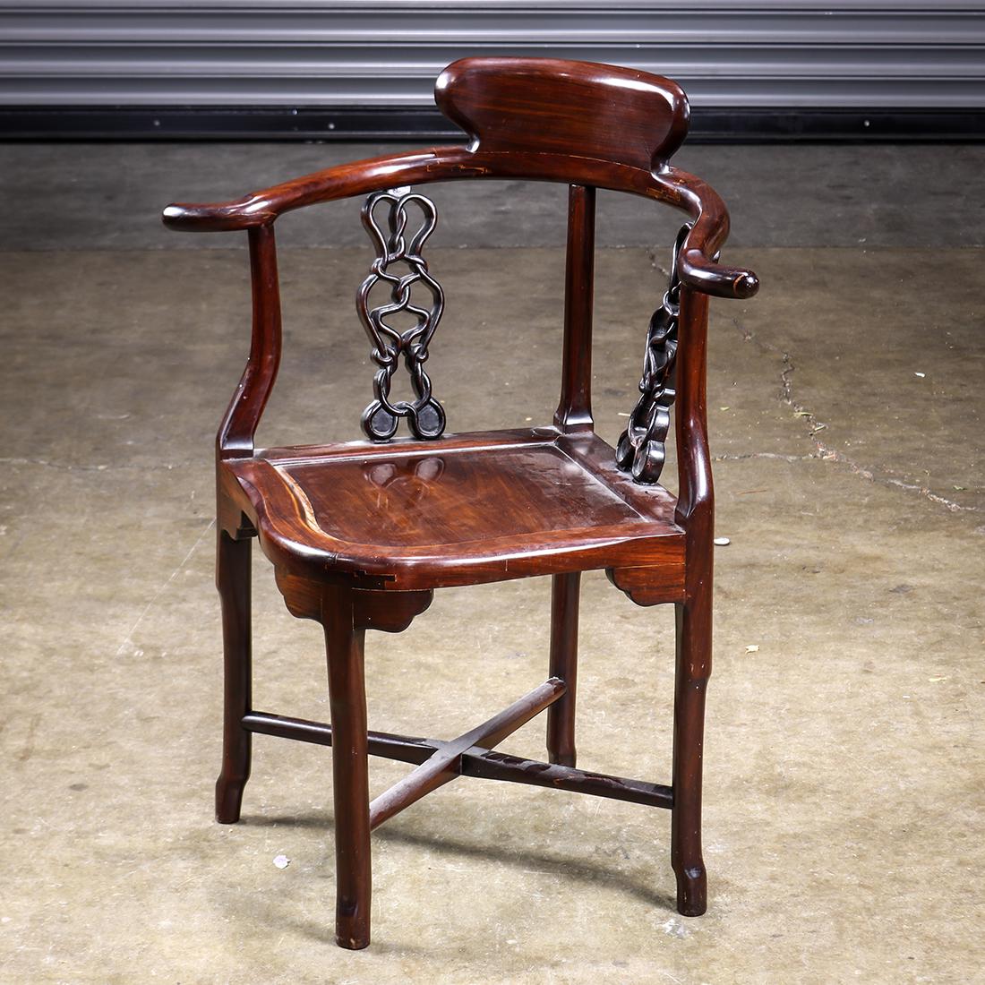 Chinese Wood Corner Chair, Endless Knot: Chinese hardwood corner chair, with panels of pierced endless knot bracing the back rail and seat, rasied on shaped supports with cross stretchers, 33"h