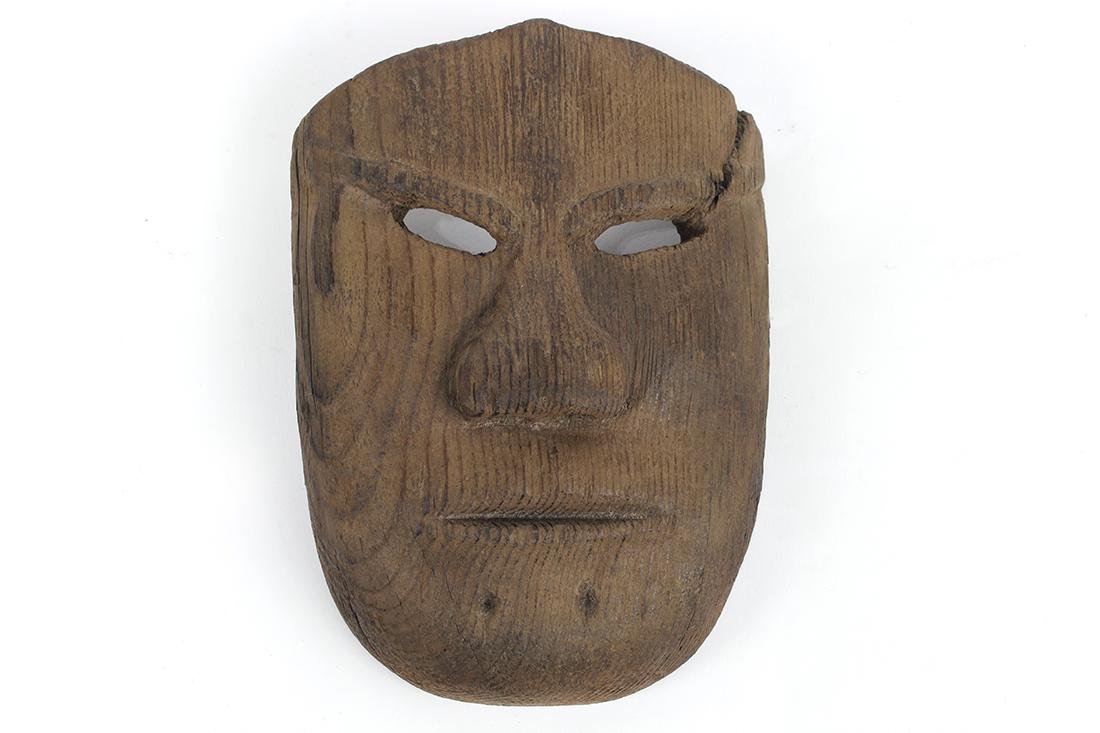 A powerful and dramatic old Eskimo mask, 18th or 19th (1 of 2)