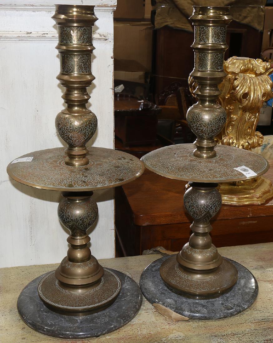 Pair of Indian brass candle prickets (1 of 2)
