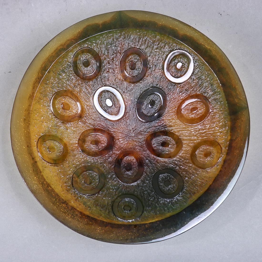 Daum pate de verre footed bowl: Daum pate de verre footed bowl, having a tapered form with repeating circular accents, executed in amber, signed "Daum, Nancy, 2006," 2"h x 8.5"w