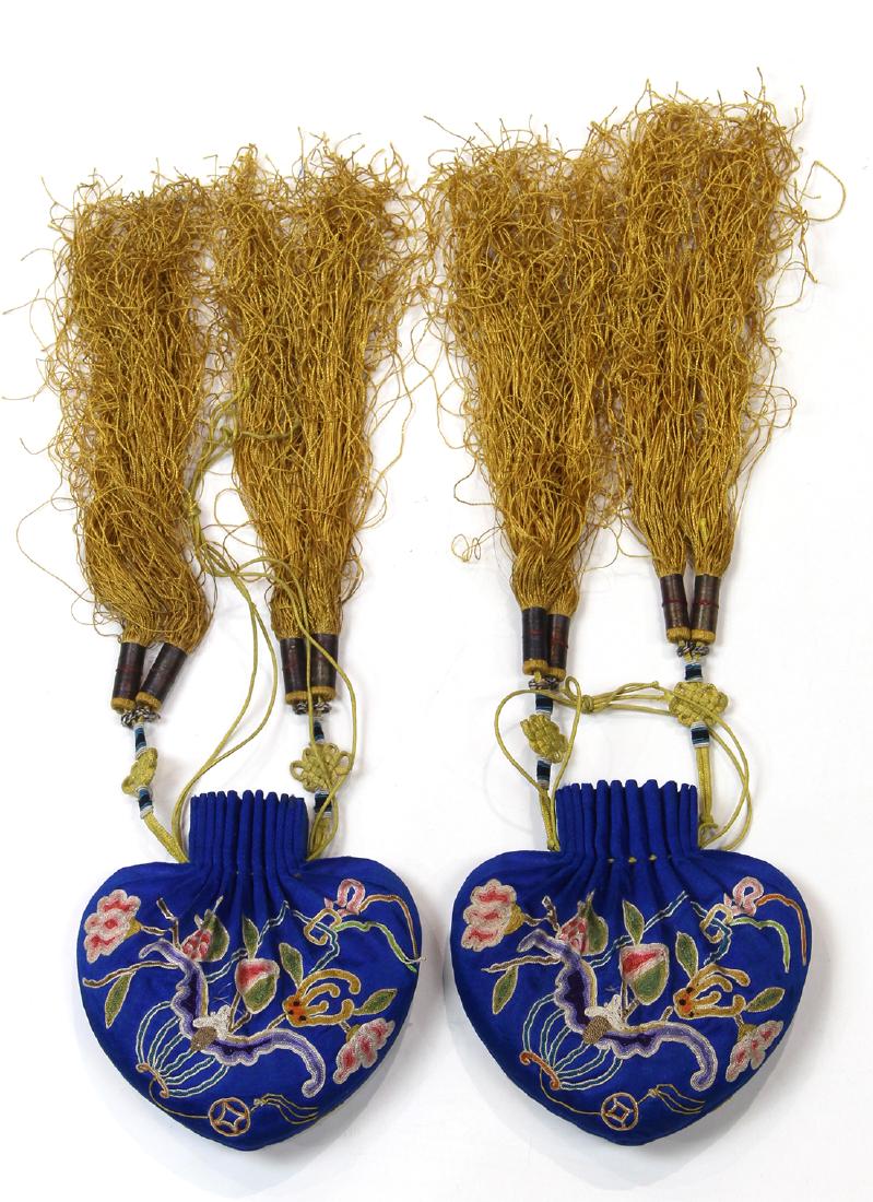 Pair of Chinese Blue Silk Pouches/Sachets, Bat: Pair of Chinese blue silk sachets/pouches, silk thread couched with a bat and lantern amid sprigs of pomegranate, peach and Buddha hand citron, on an electric blue satin ground, with yellow tassels, 3