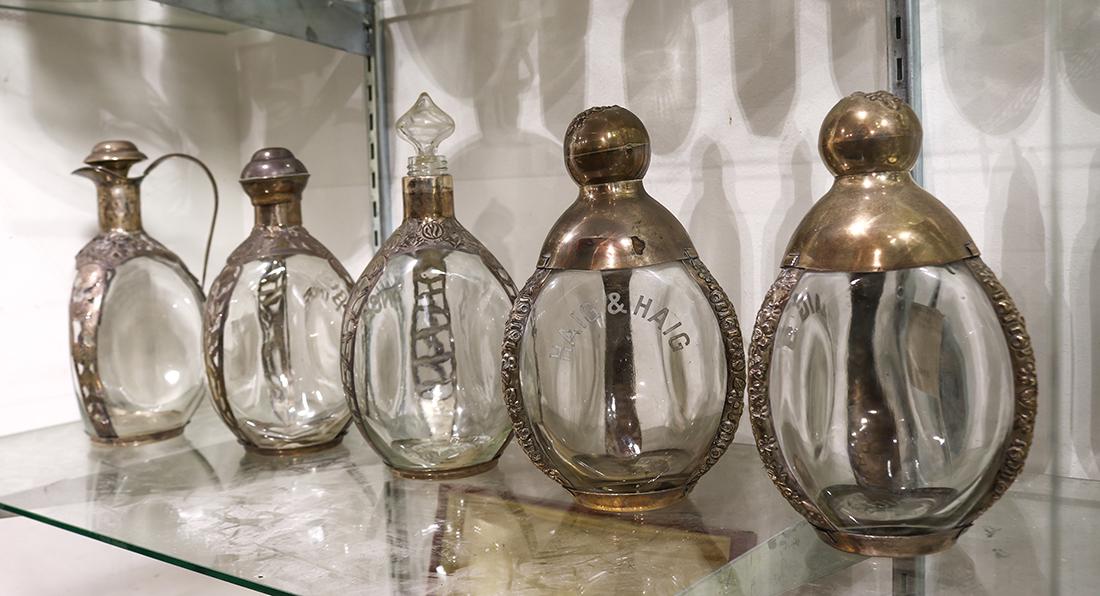 (lot of 5) Edwardian tripartie glass decanters, each: (lot of 5) Edwardian tripartie glass decanters, each with sterling silver overlay and fitted stoppers, largest: 8.5"h
