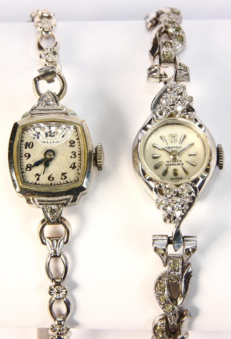 (Lot of 2) Lady's diamond, 14k white gold, white stone: (Lot of 2) Lady's diamond, 14k white gold, white stone and metal wristwatches Including 1) lady's Croton, 17 jewels, C2542, 14k white gold, accented by (10) single-cut diamonds, weighing a total of ap