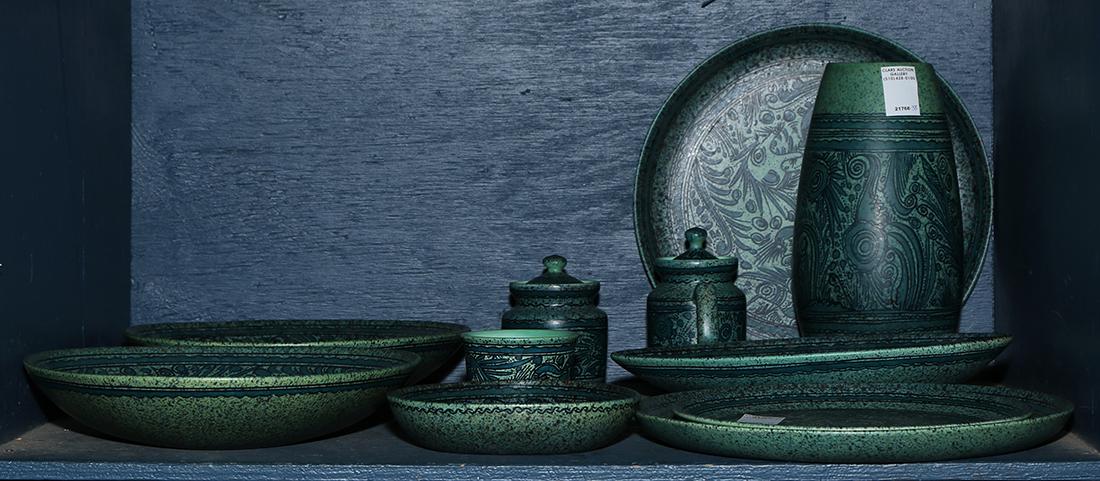 One bin of Ceramica de Taxco Tissot dishes, each with a: One bin of Ceramica de Taxco Tissot dishes, each with a speckled green and blue glaze, consisting of bowls, platters, a large vase, (2) lidded jar, etc., largest: 20"h; Provenance: Stanford Research I