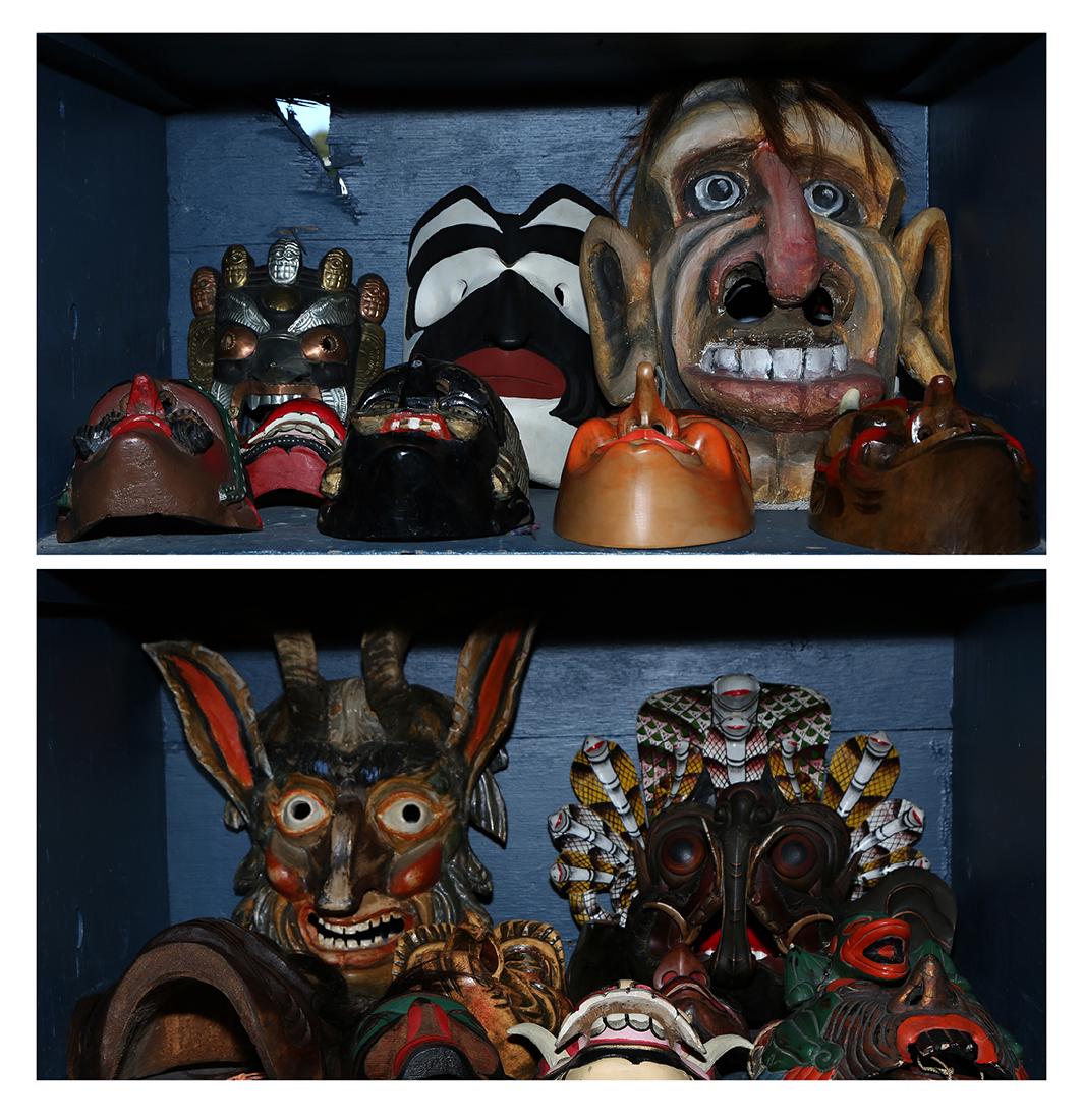 Two bins of decorative carved wood masks, each (1 of 3)