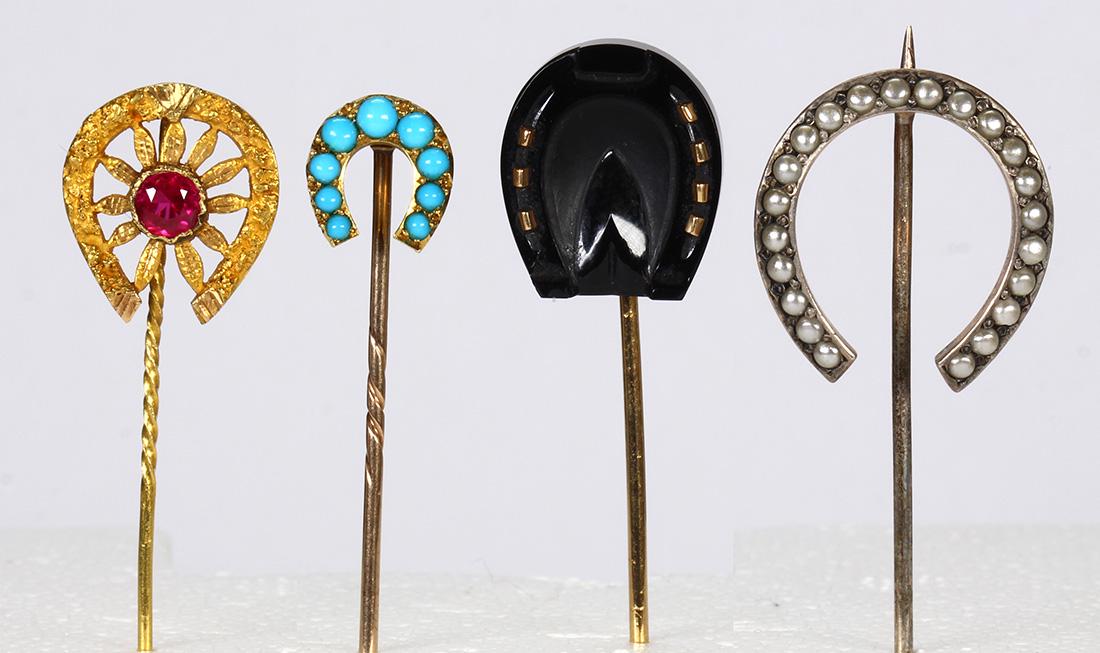 Multi-stone and yellow gold horseshoe stick pins (1 of 3)