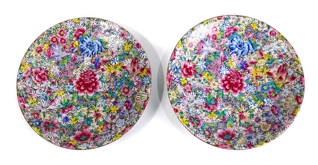Chinese Mille Fleur Porcelain Chargers: Pair of Chinese porcelain chargers, of mille fleur pattern, with apocryphal Qianlong mark on base,16"w; Provenance: Stanford Research Institute International (Menlo Park, CA)
