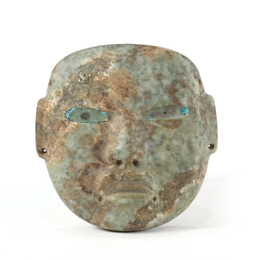 Jade or hardstone mask showing signs of long burial, (1 of 7)