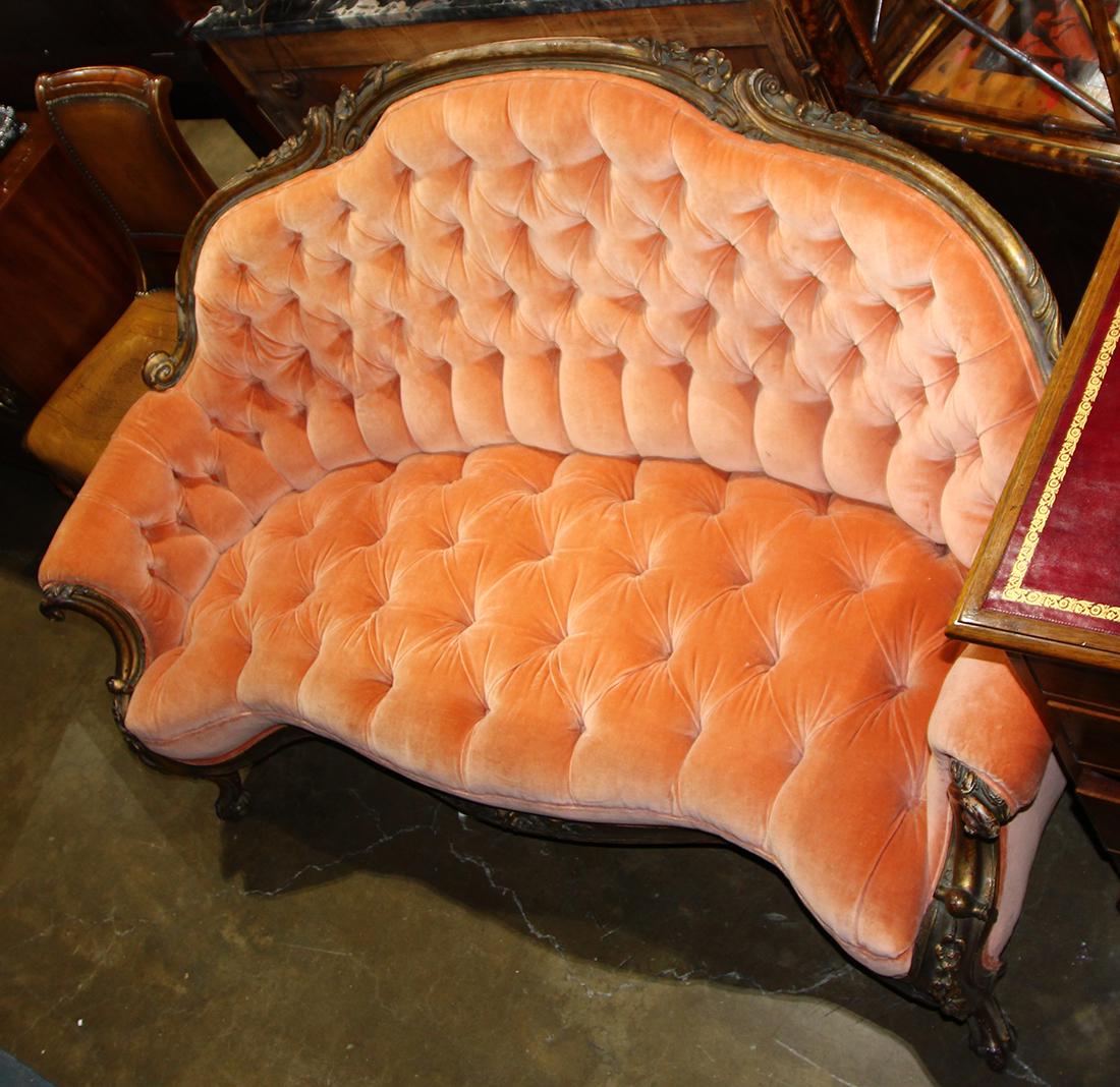 Victorian style parlor sofa, having a shaped back and