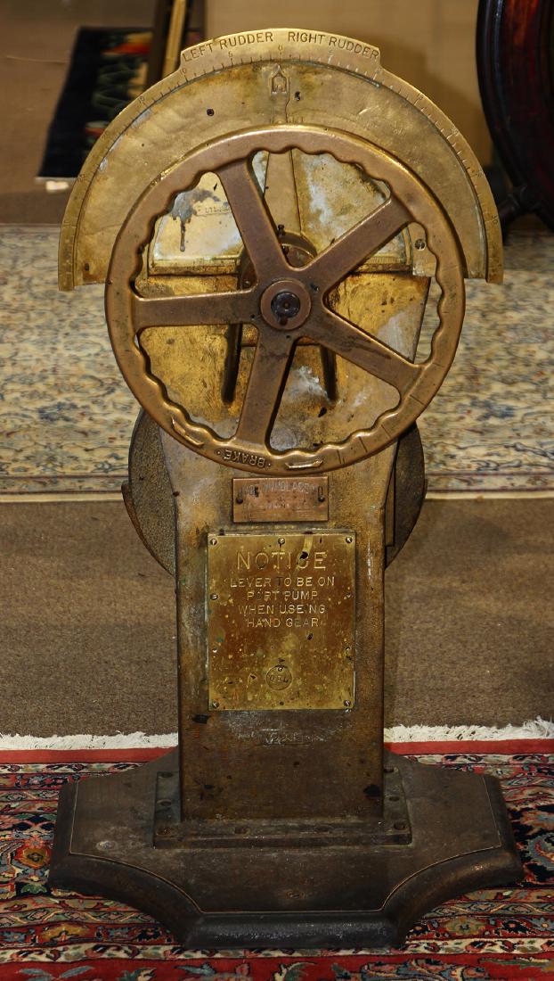 Ship's wing station or helm circa 1940, made in Bath,: Ship's wing station or helm circa 1940, made in Bath, Maine, with rudder and angle indicator, non-functional, likely from an Atlantic merchant mariner cargo ship, 41"h x 21.5"w. Provenance: Property f