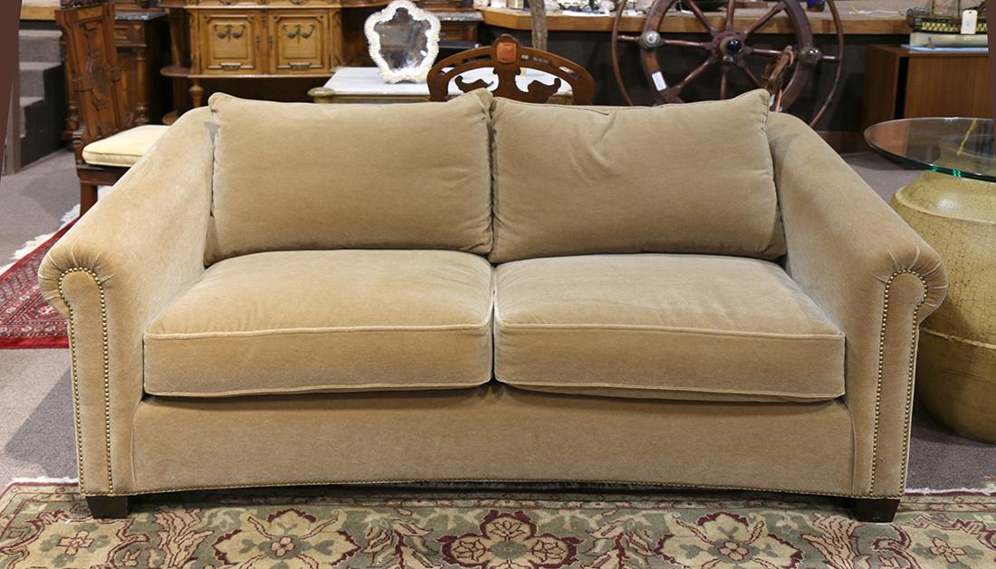 Moderne custom upholstered sofa, executed in beige, (1 of 3)