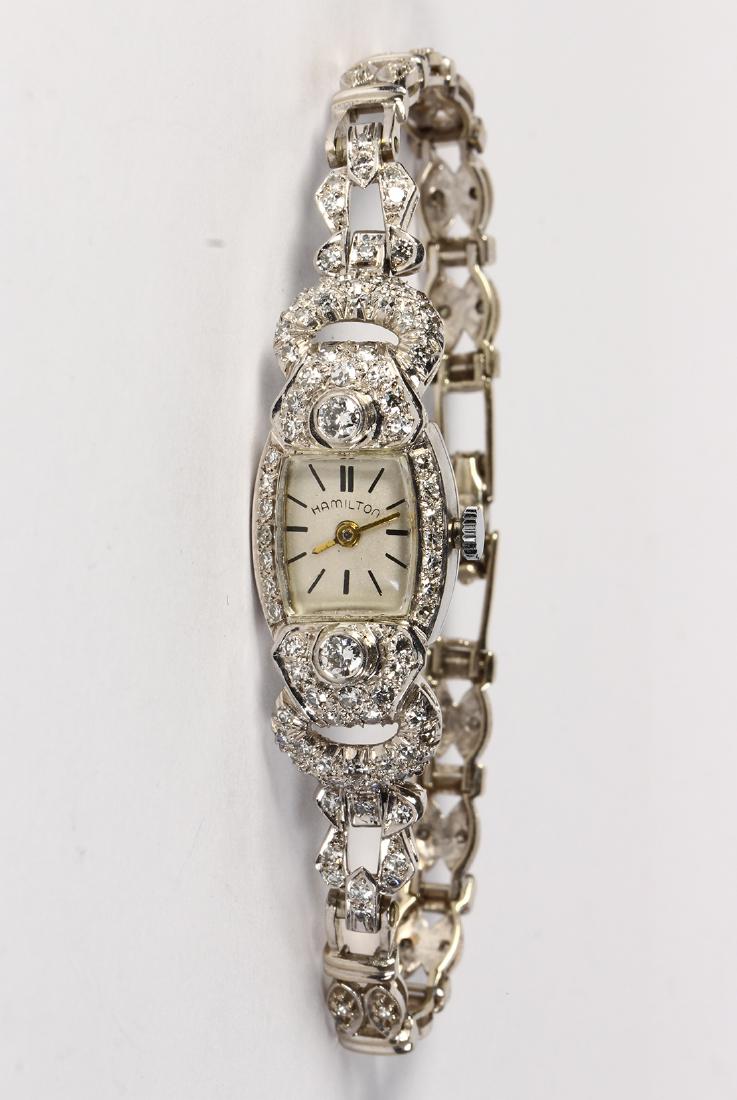 Lady's diamond, platinum and 14k white gold wristwatch (1 of 4)