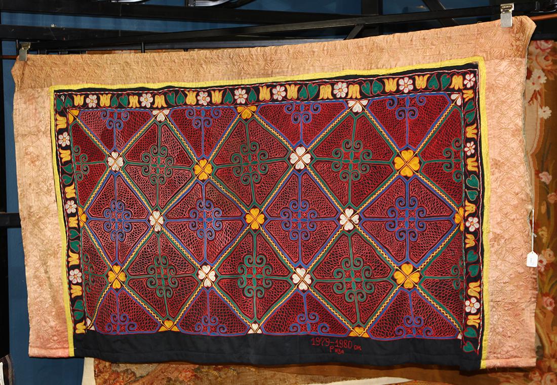 Mongolian 'yurt' wall hanging dated 1979-1980: Mongolian 'yurt' wall hanging dated 1979-1980, having multi colored geometric reserves, 41"h x 78"w