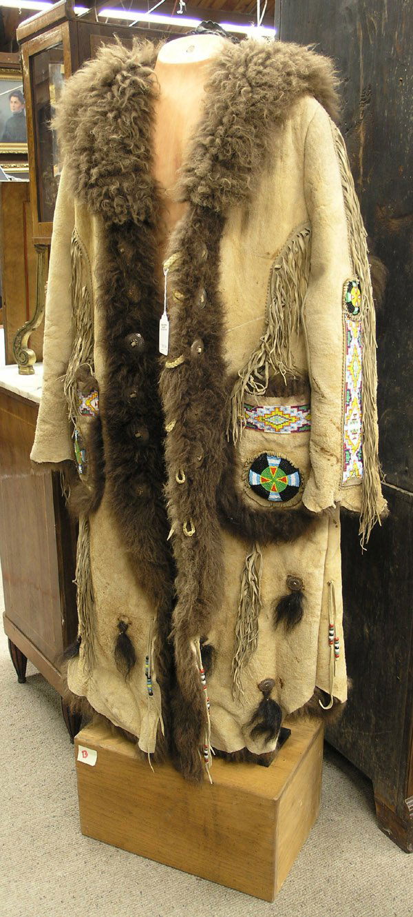 6502 Buffalo hide coat with loom beadwork Sep 09, 2007 Clars