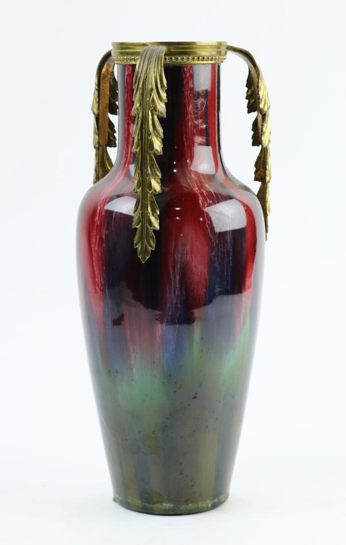 French Jerome Massier (1850-1915) bronze mounted vase: French Jerome Massier (1850-1915) bronze mounted vase, having acanthus decorated mounts continuing to the shoulder with burgundy, purple to green glazes, underside marked Jerome Massier, 12.5"h