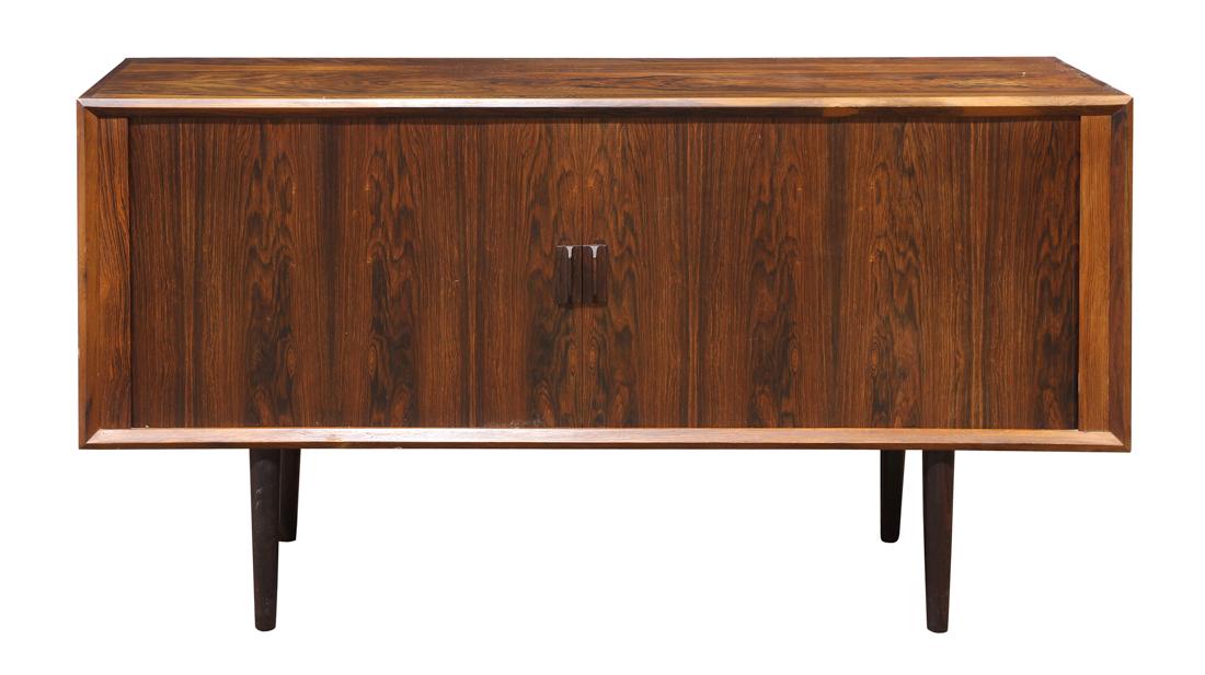 Danish Modern Ib Kofod-Larsen rosewood low sideboard: Danish Modern Ib Kofod-Larsen rosewood low sideboard, having a rectangular top, above two tambour doors, opening to a fitted interior, and rising on tapered legs, 31"h x 59"w x 19"d