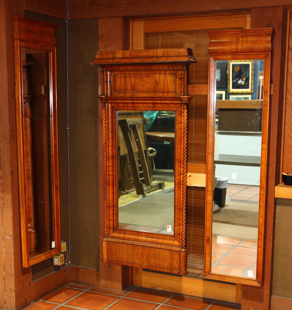 Biedermeier overmantle mirror: Biedermeier overmantle mirror, in three parts, the center flanked with barley twist pilasters, the side pier mirrors with rectangular looking glasses in two parts, largest: 59"h x 28.5"w