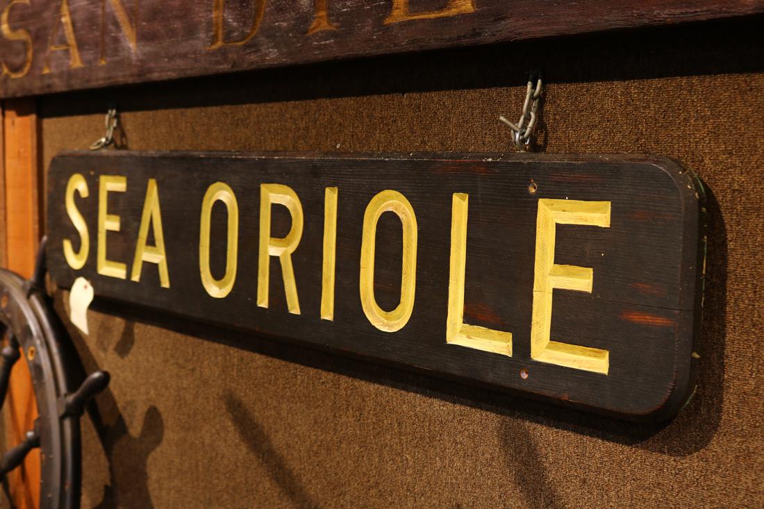 Carved ship's nameboard reading "Sea Oriole" with gilt: Carved ship's nameboard reading "Sea Oriole" with gilt lettering, 13.5"h x 72"w Property from the Spenger's Fish Grotto Collection, Berkeley CA
