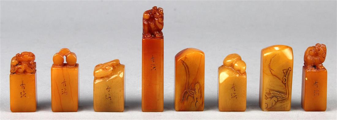 Set of Chinese Stone Seals: (lot of 8) Set of Chinese soapstone seals, three each surmounted by a mythical beast; two carved with foliage in low relief; with wood box, largest seal: 2.5"h