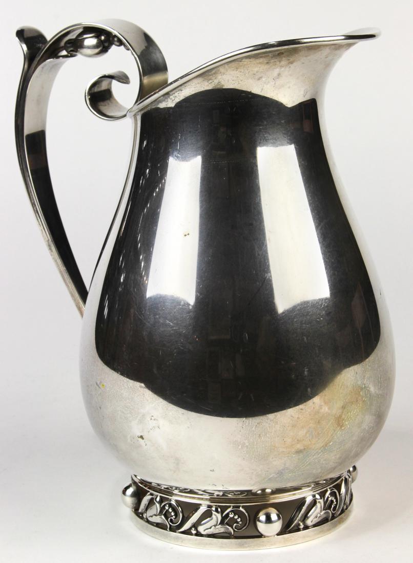 International sterling silver water pitcher in the (1 of 3)