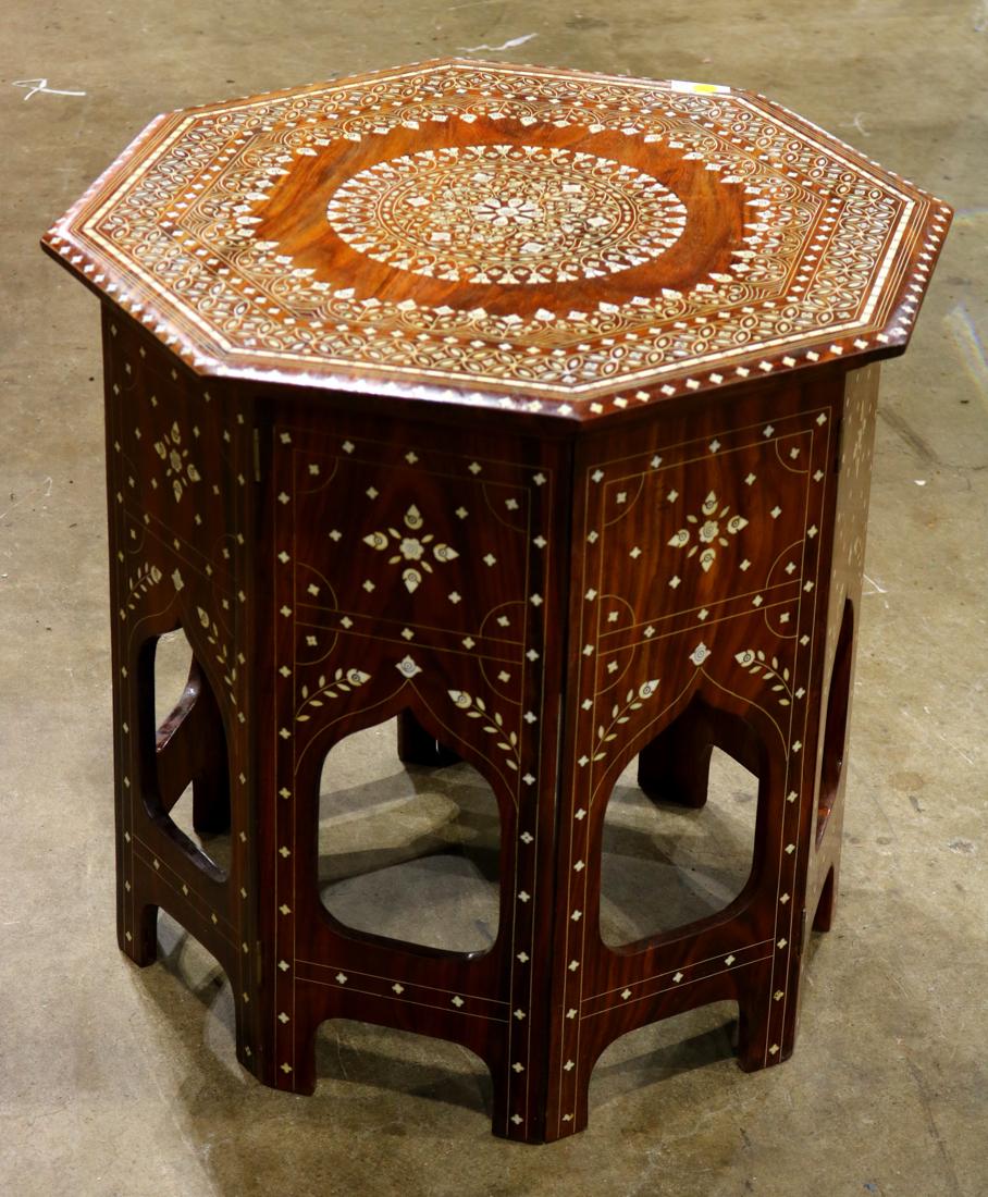 Moroccan style inlaid tabouret table, having an (1 of 3)