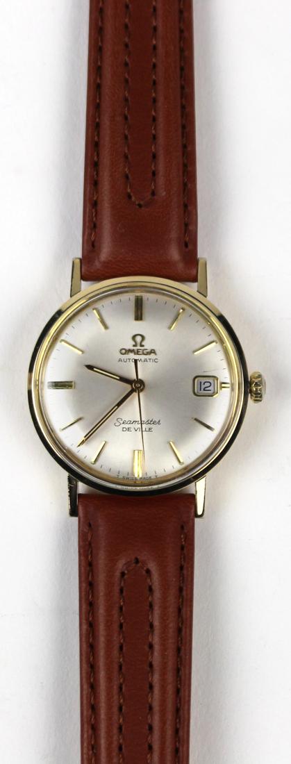 Omega Seamaster gold-filled wristwatch: Omega Seamaster gold-filled wristwatch Dial: round, silvered, applied baton hour markers, black outer minutes track, with luminous dot hour markers (luminosity loss) aperture at 3:00 for date, luminou