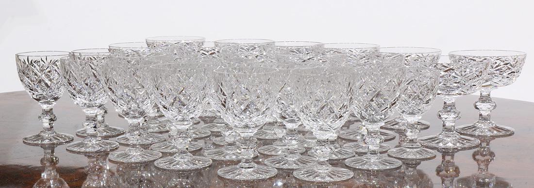 St. Louis crystal stemware group: St. Louis crystal stemware group, consisting of (12) champagne bowls, (11) cordials, and (12) white wine glasses, each with etched mark on underside, largest: 5"h