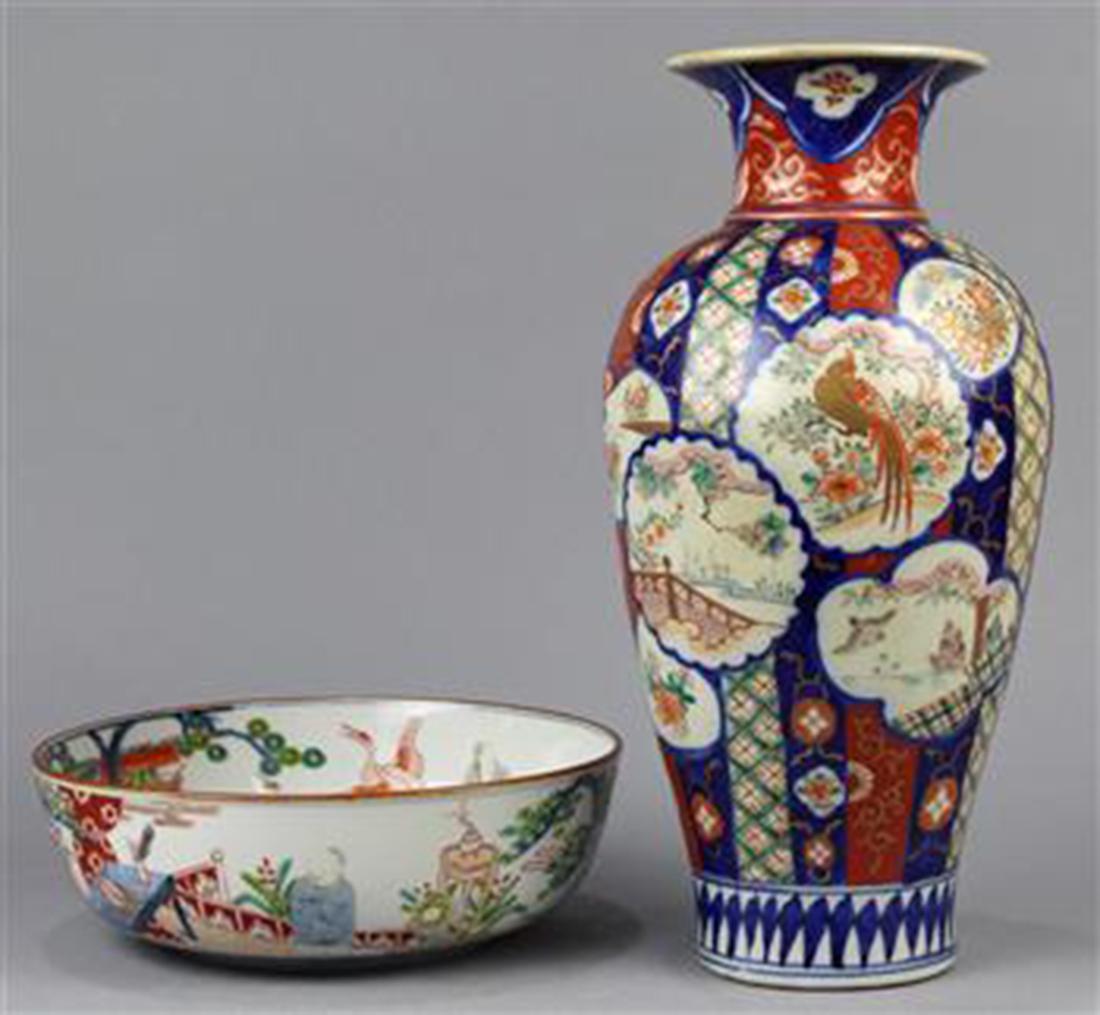 Japanese Imari Vase, Bowl, 19c: (lot of 2) Japanese Imari ware, late 19th century: a vase with flared neck above ovoid body, landscape, phoenix, butterflies, flowers in panels of various shapes; a bowl with a dragon in the center we