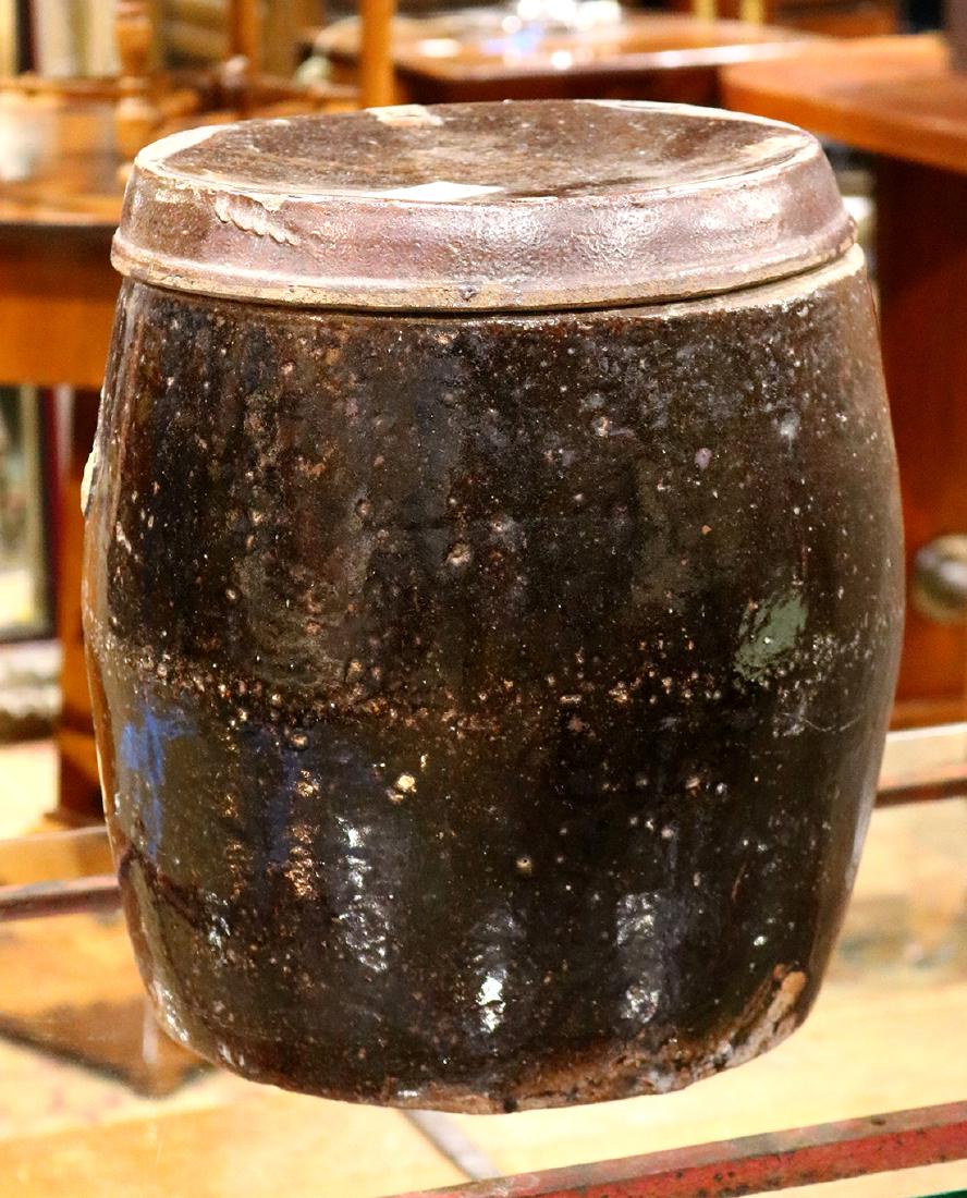 Lidded brown stoneware pot, having a tapered form, 14"h (1 of 2)
