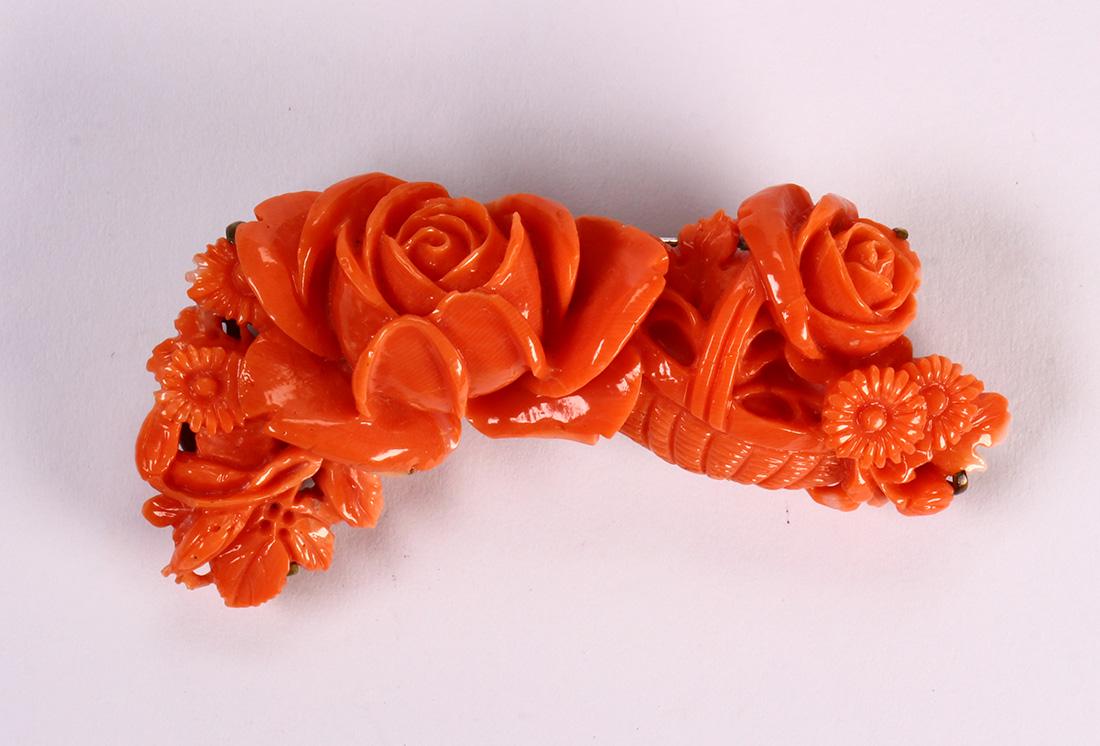Carved coral, silver and metal brooch (1 of 2)