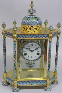 Cloisonne cased mantle clock: Cloisonne cased chiming mantle clock with onion dome top, 18.5'' (pendulum in office)